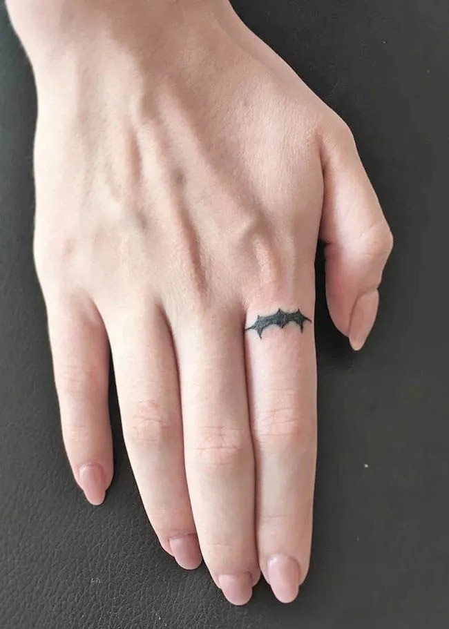 Finger Dot Tattoo