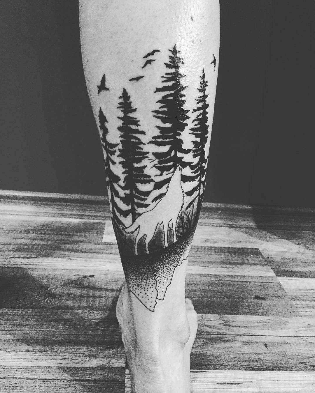 Forest Silhouette Tattoo With A Wolf