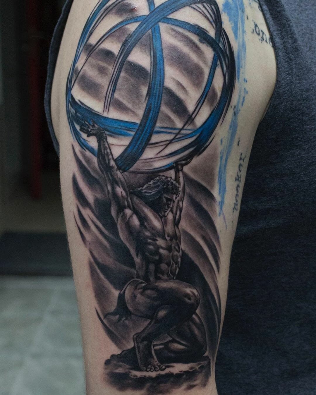 Dynamic Inkwash Atlas Tattoo