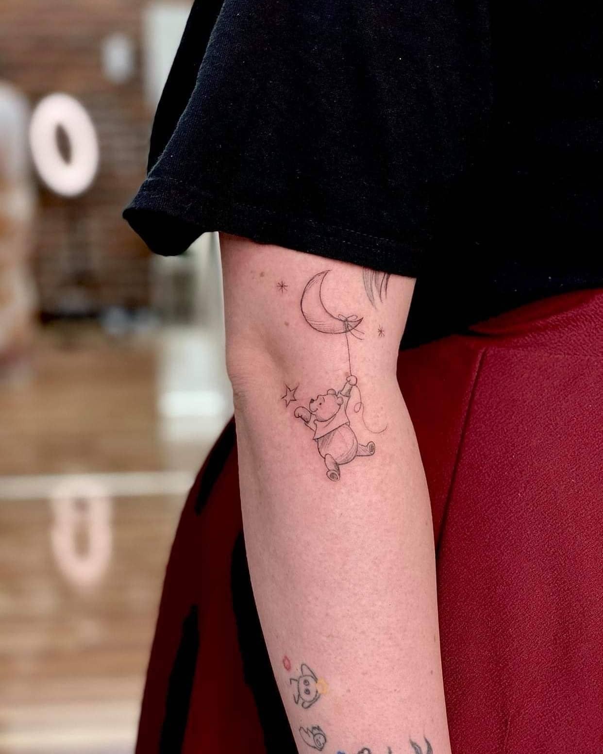 Winnie The Pooh Flying With A Moon Balloon Tattoo