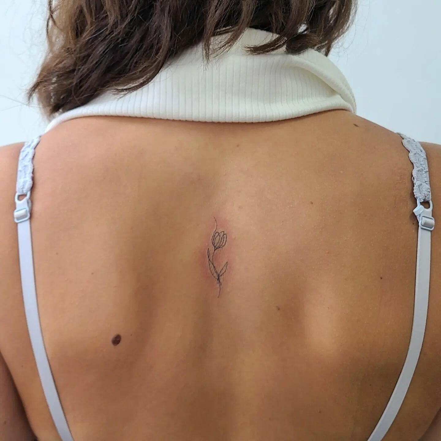 Small Flower Back Tattoo