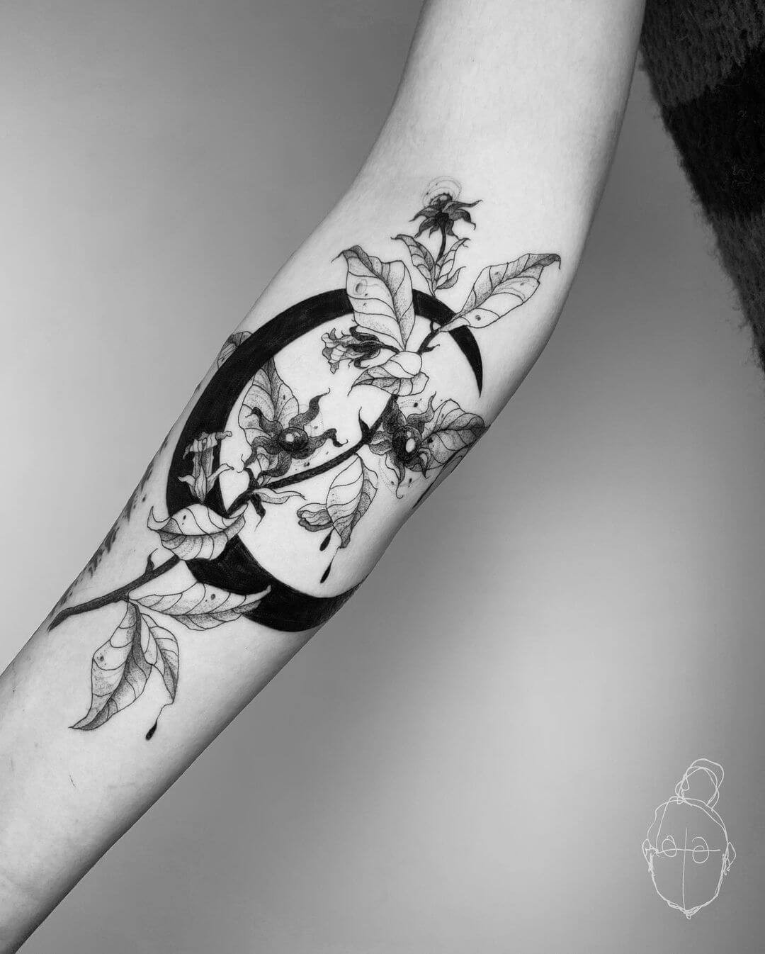 Crescent Moon Cutting Through Deadly Nightshade Tattoo