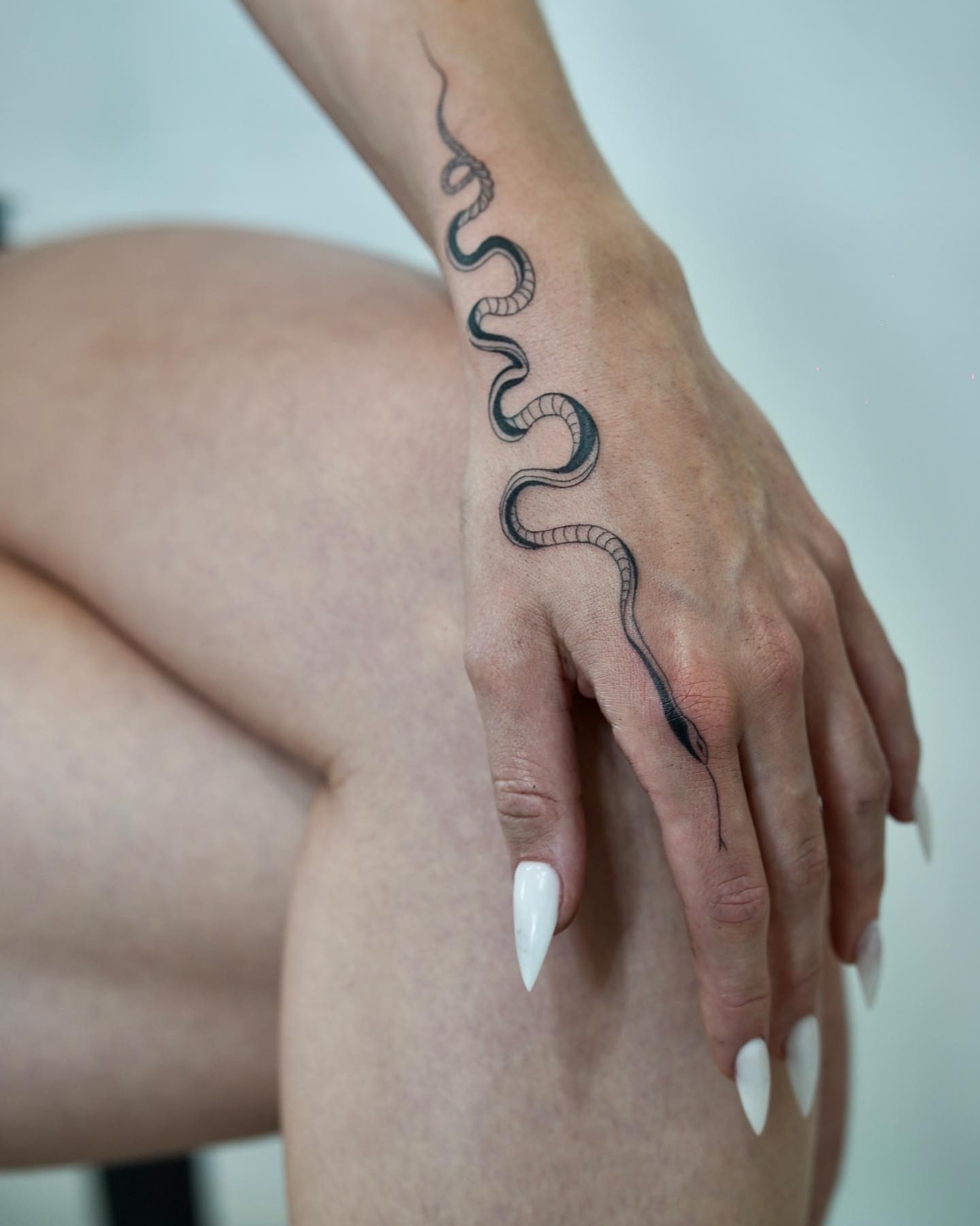 Elegant Snake Tattoo On Finger