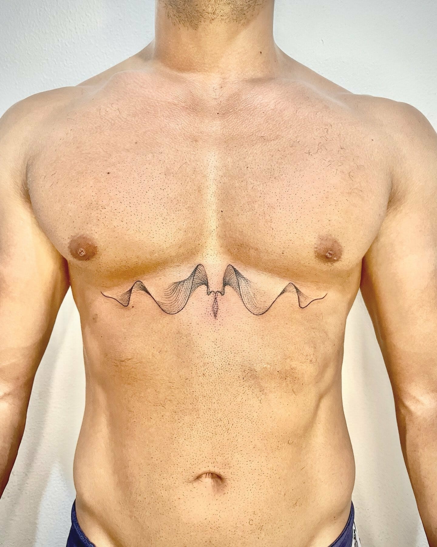 Chest Soundwave Tattoo