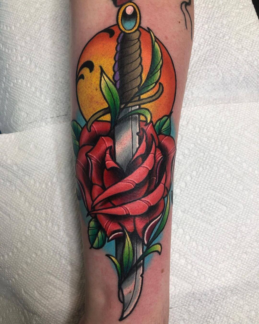 Bright Rose And Dagger Tattoo