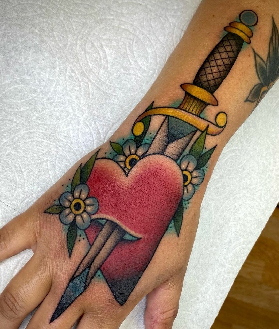 Heart And Dagger Tattoos