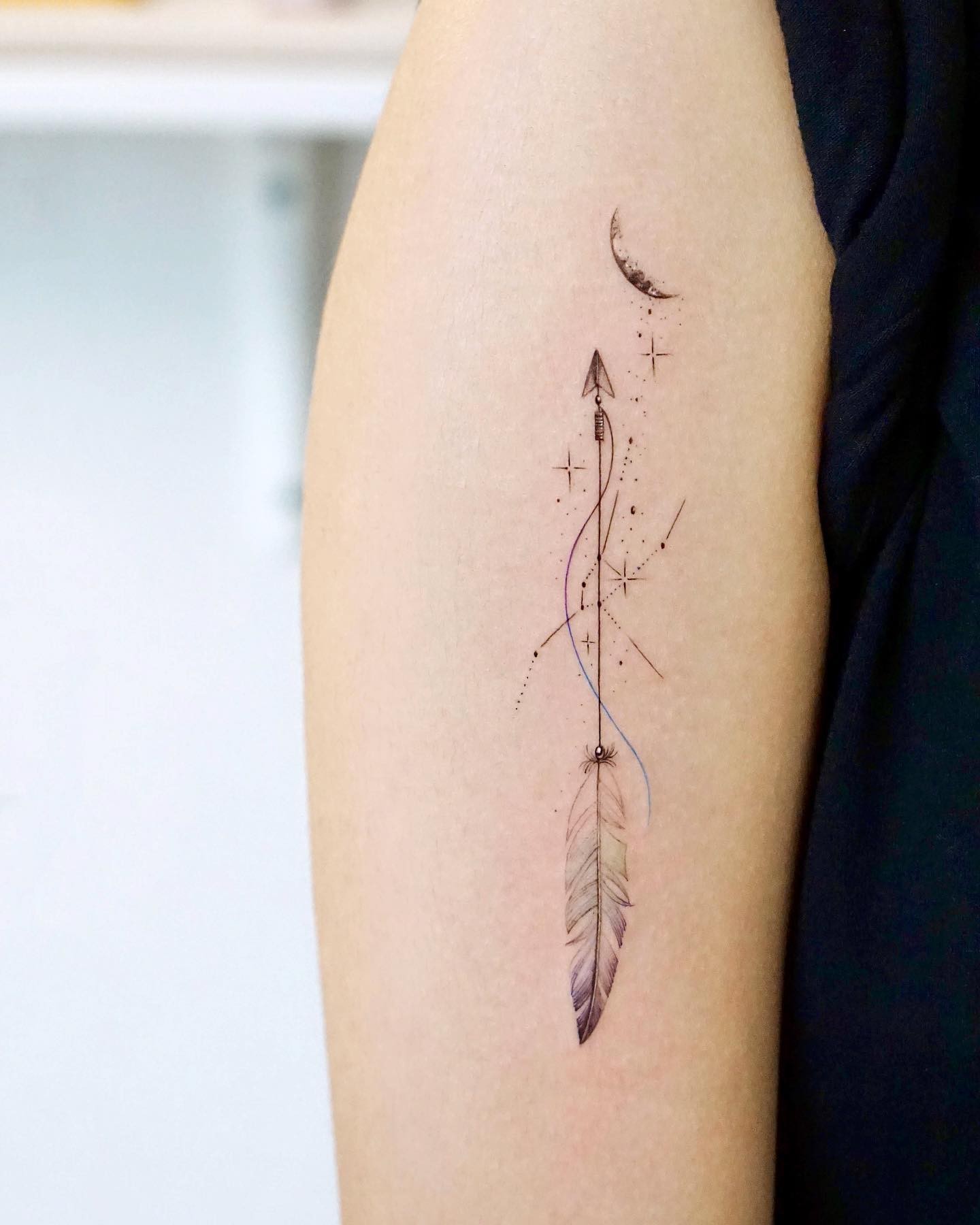 A Geometric Taurus Arrow Tattoo