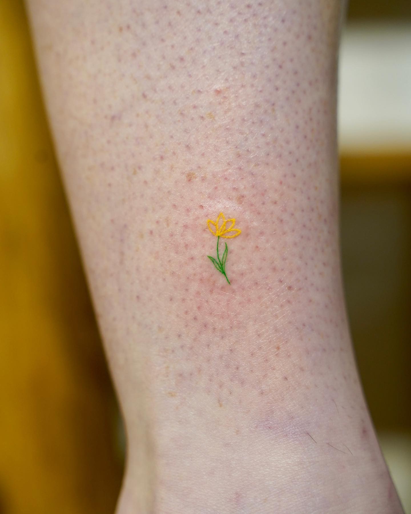 Tiny Daffodil Tattoo Design