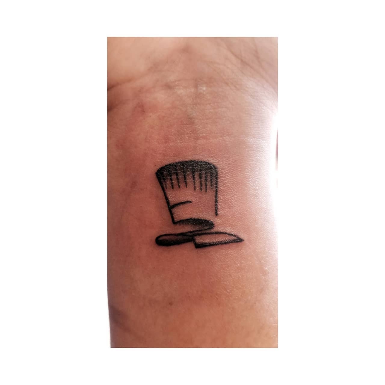 Cute Head Chef Tattoo On Wrist