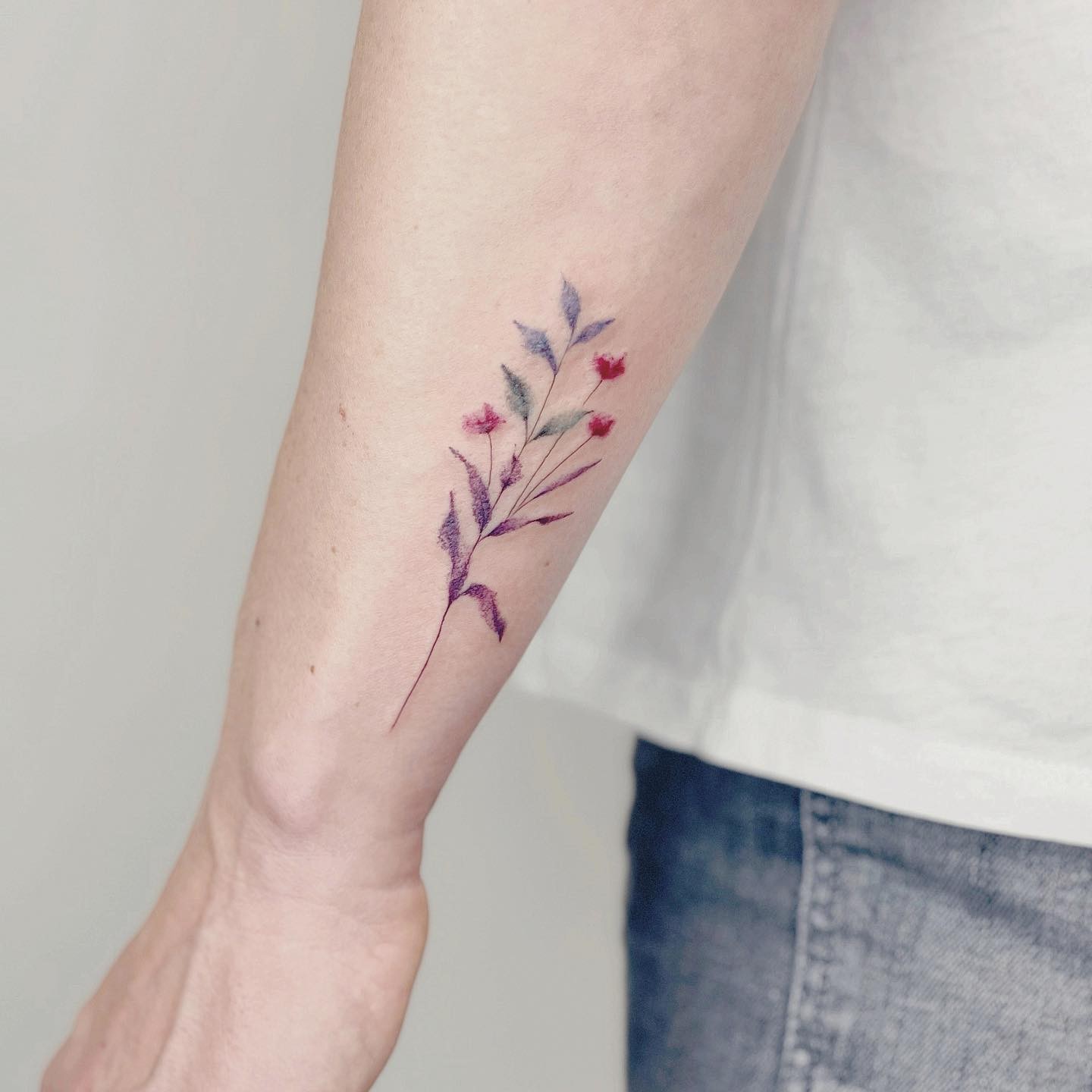 Multicolored Tiny Wildflower Tattoo Design