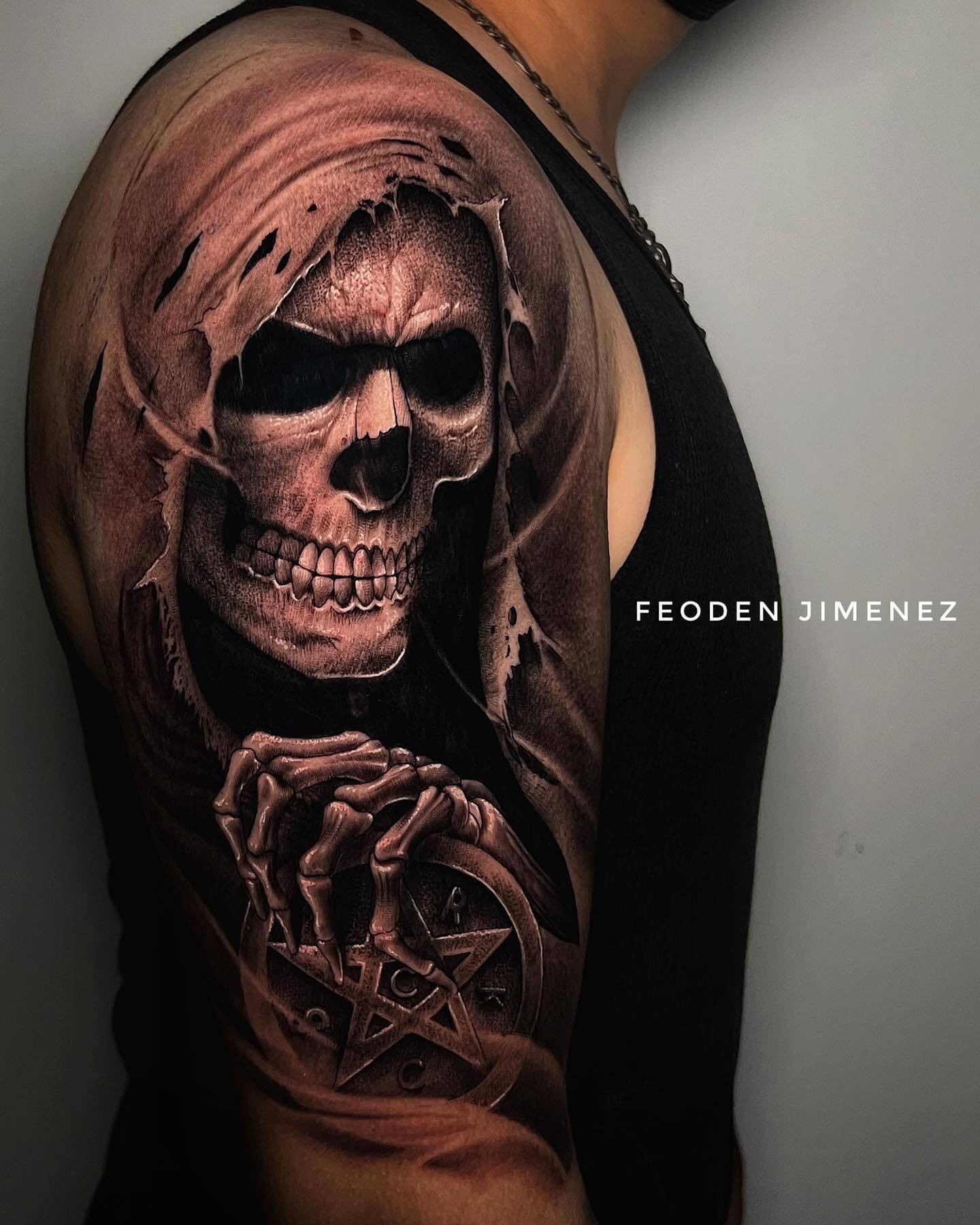 Black Skull Upper Arm Sleeve Tattoo