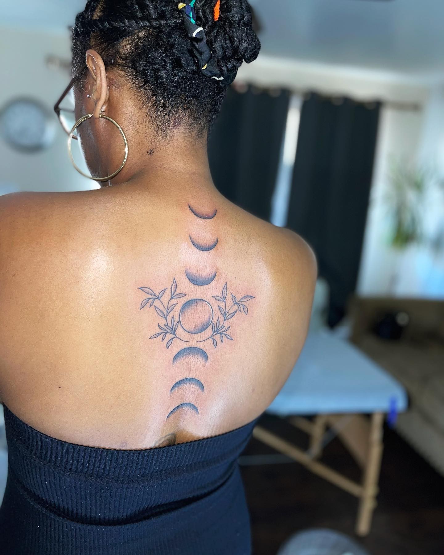 Moon Phases Spine Tattoo Idea