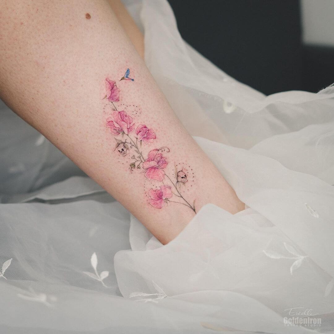 Sweet Pea Flower Tattoo With A Hummingbird