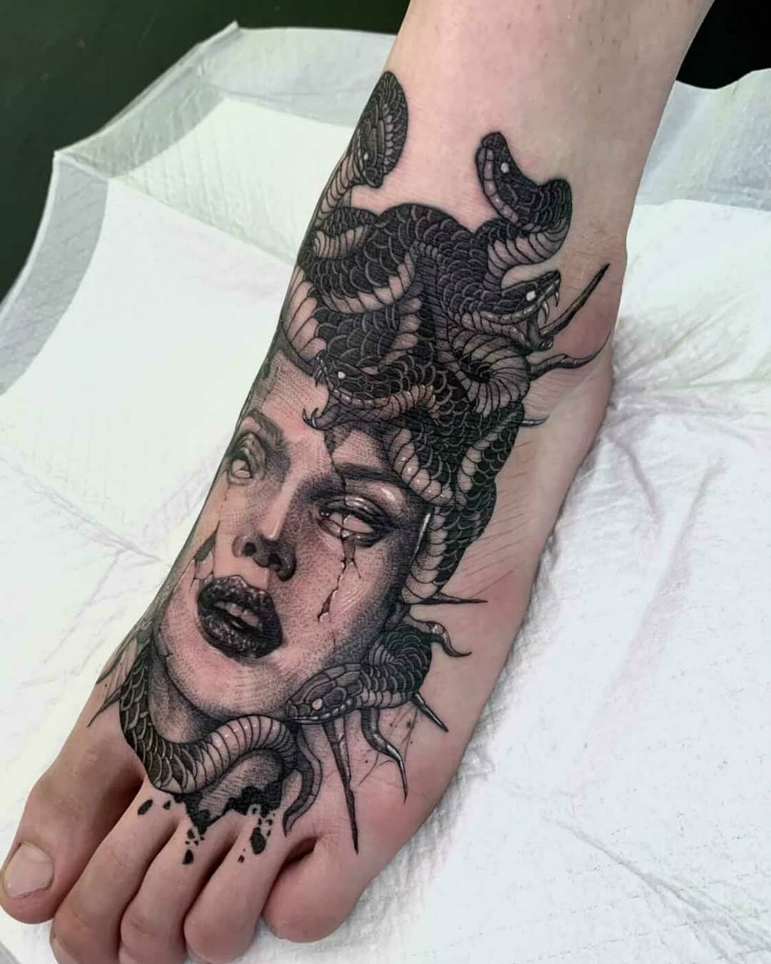 Beautiful Small Medusa Tattoo on Feet