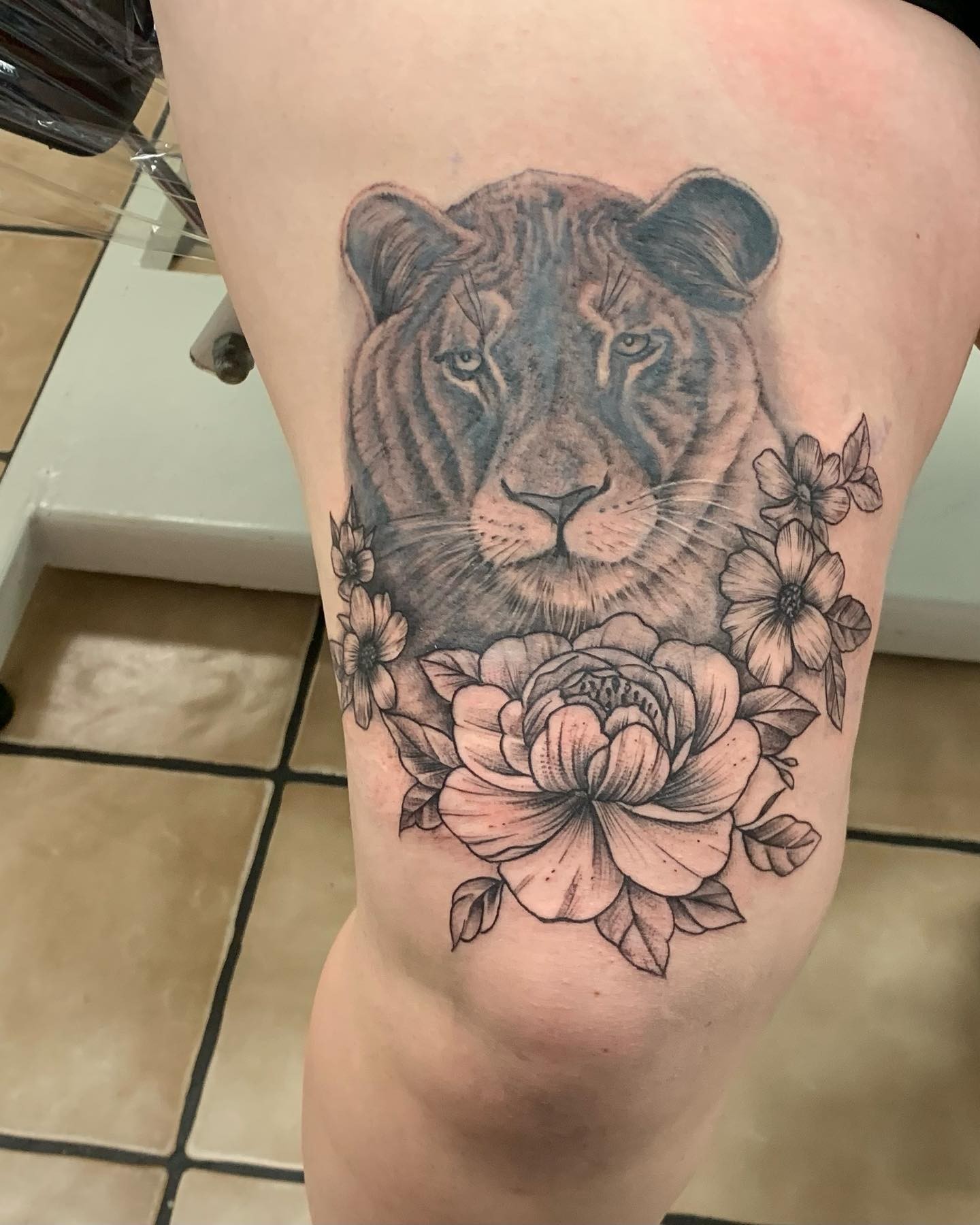 Lion Thigh Tattoo