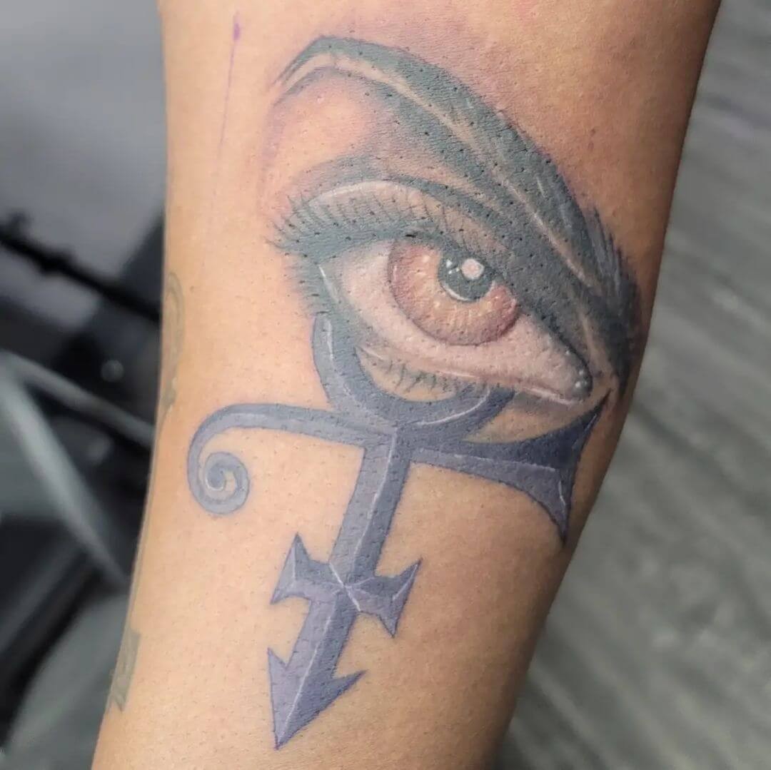 Beautiful Prince Symbol With Eye Tattoo Designs