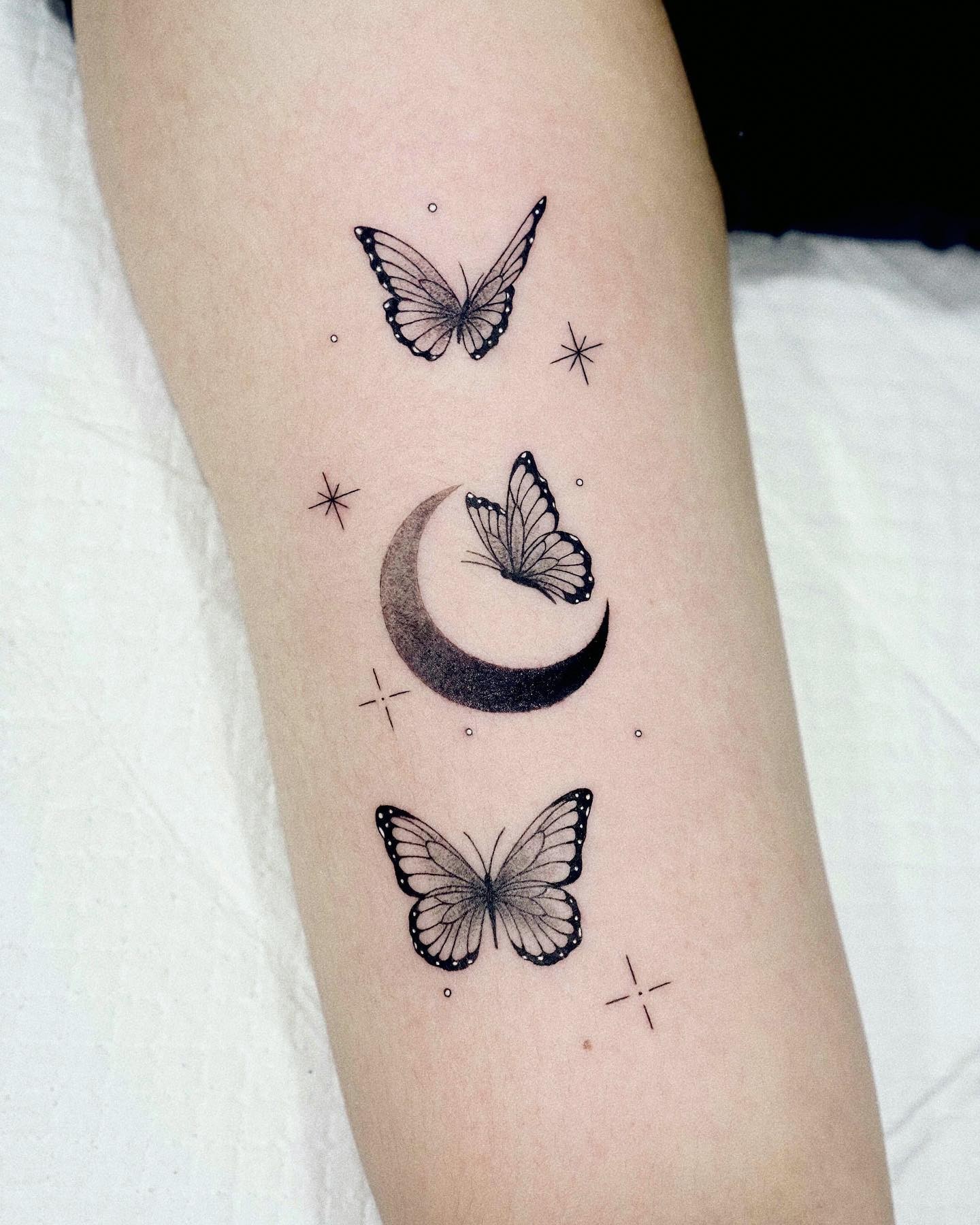 Black Butterfly With Crescent Moon Tattoo