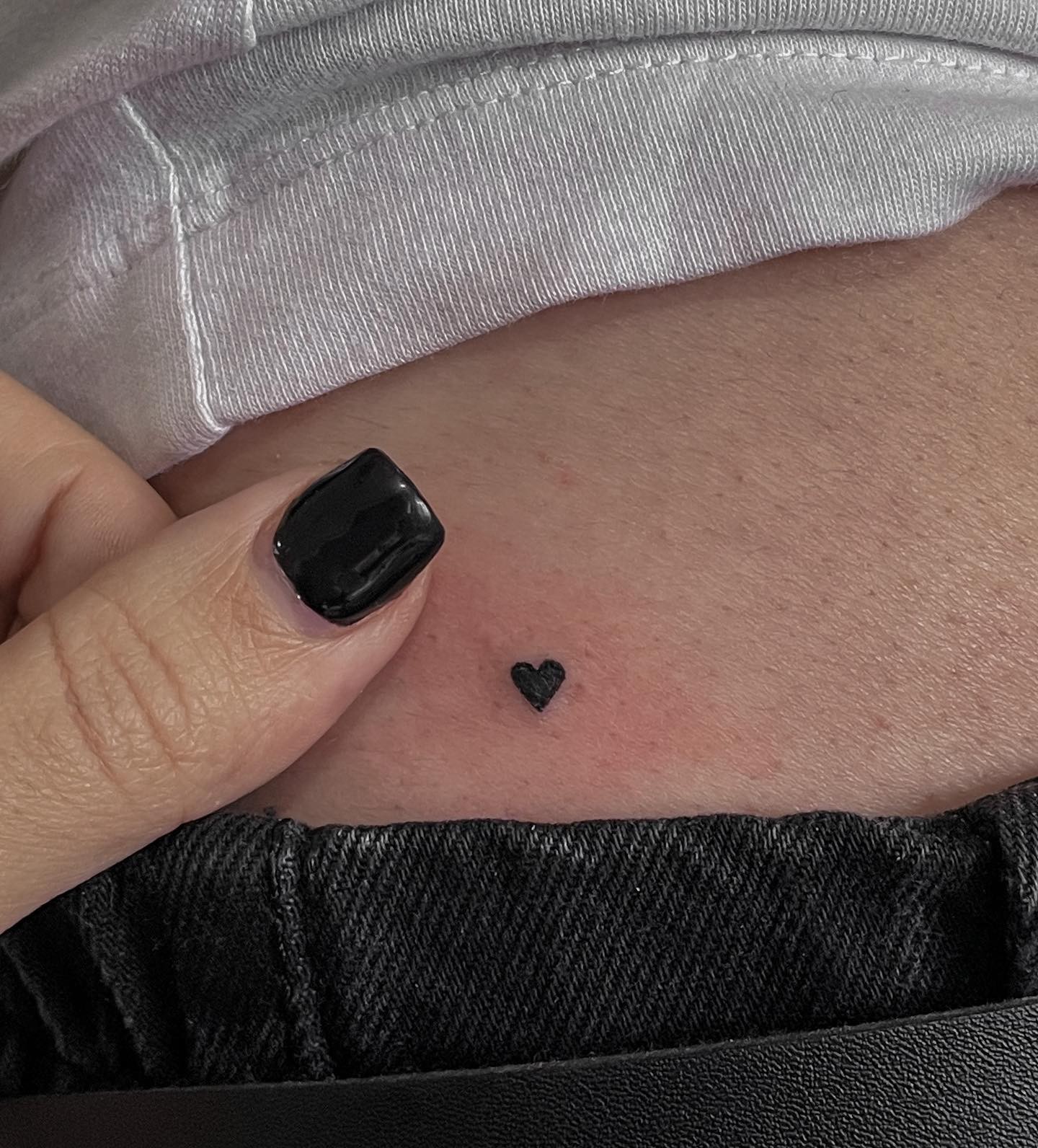 Small Black Heart Tattoo On Hand