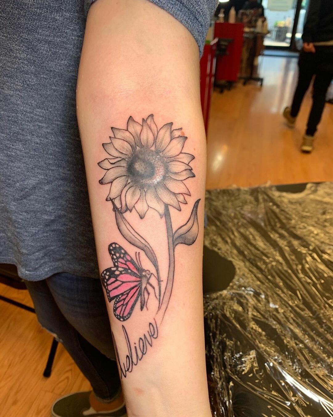 Believe Tattoo With Flowers