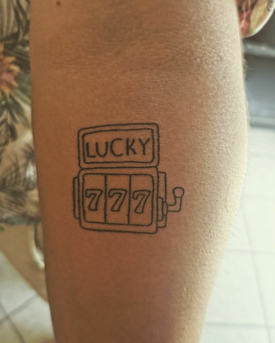 Quirky 777 Tattoo