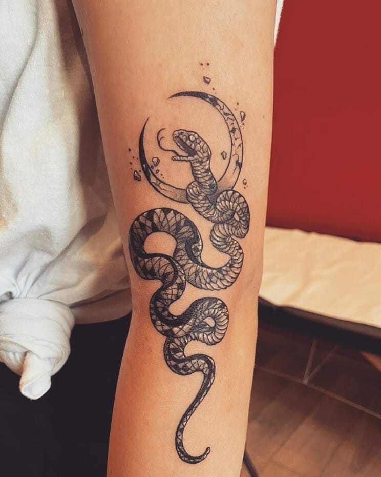 Serpent With Crescent Moon Tattoo Design