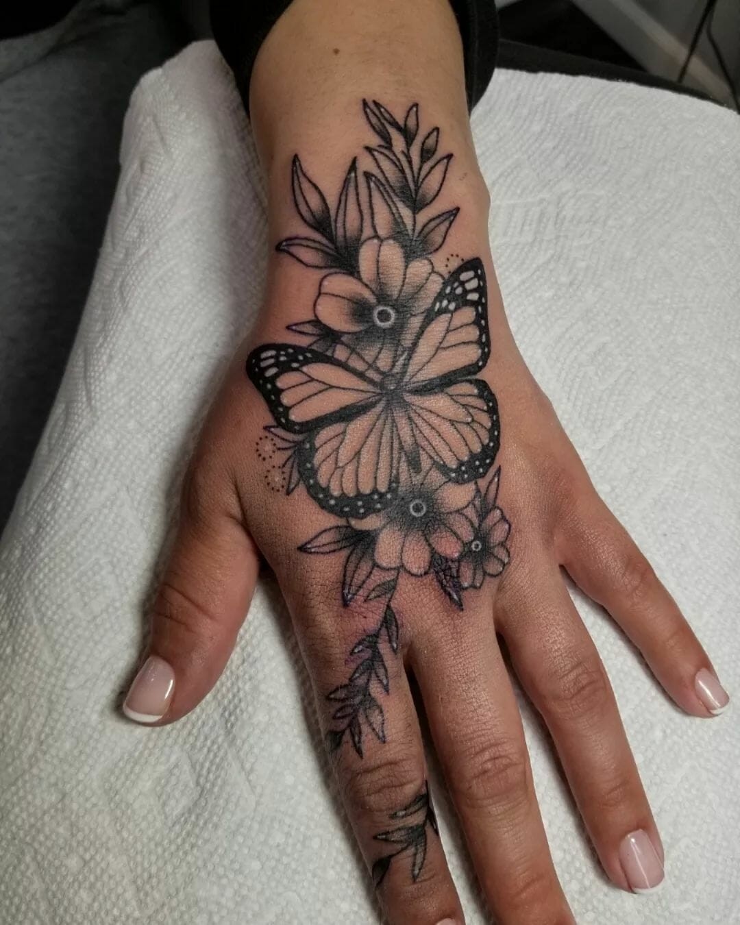 Floral Butterfly Hand Tattoo