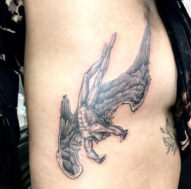 A Complex Graphic Icarus Tattoo