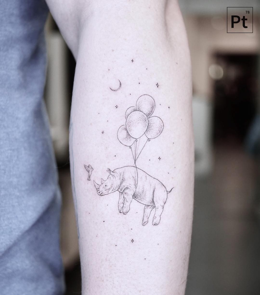 The Gentle Yet Cheerful White Rhino Tattoo