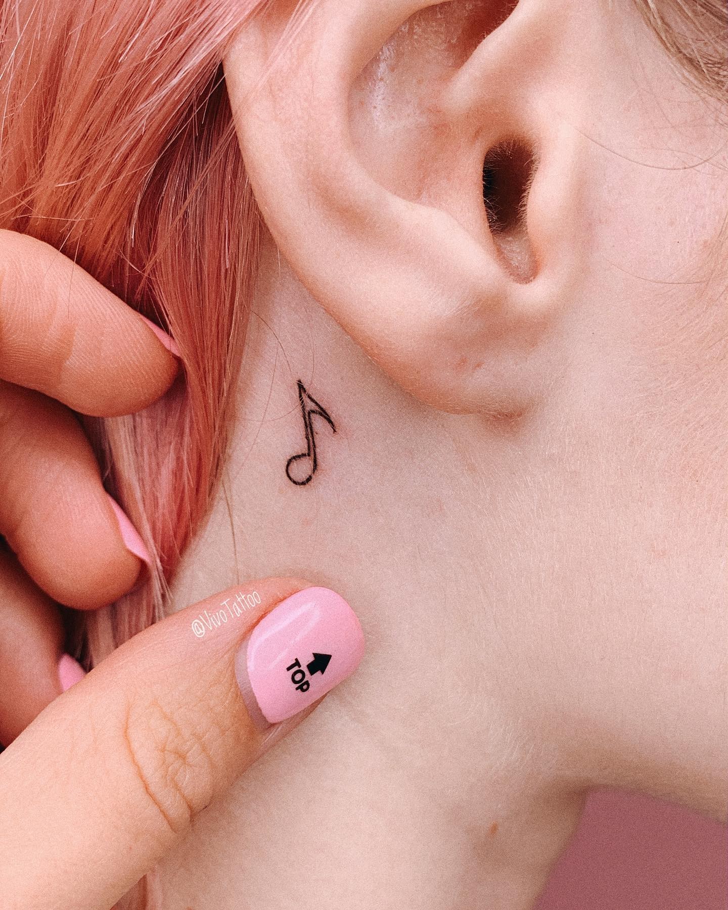 Musical Notes Tattoo Behind Ear