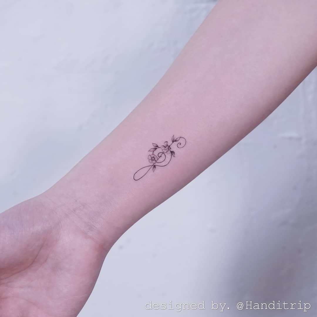 Minimalist Busan Flower Wrist Music Note Tattoo