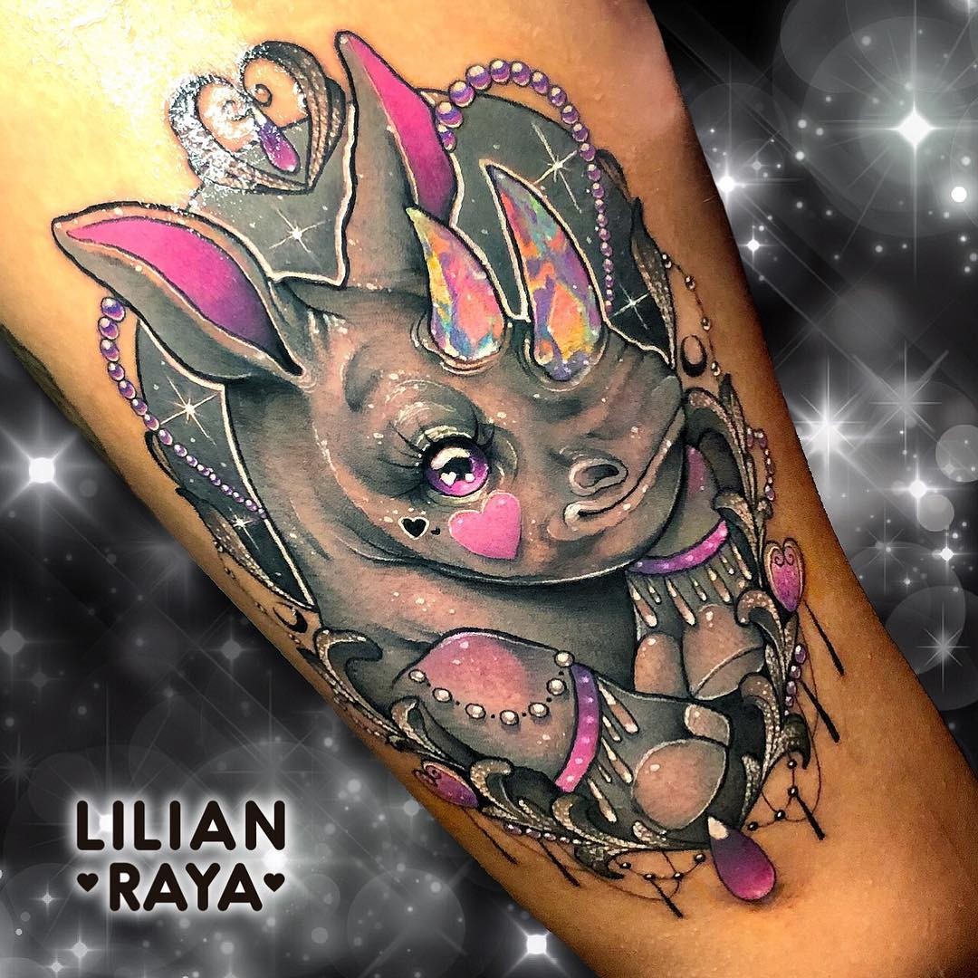 The Comical Masterpiece Of Rhino Tattoo