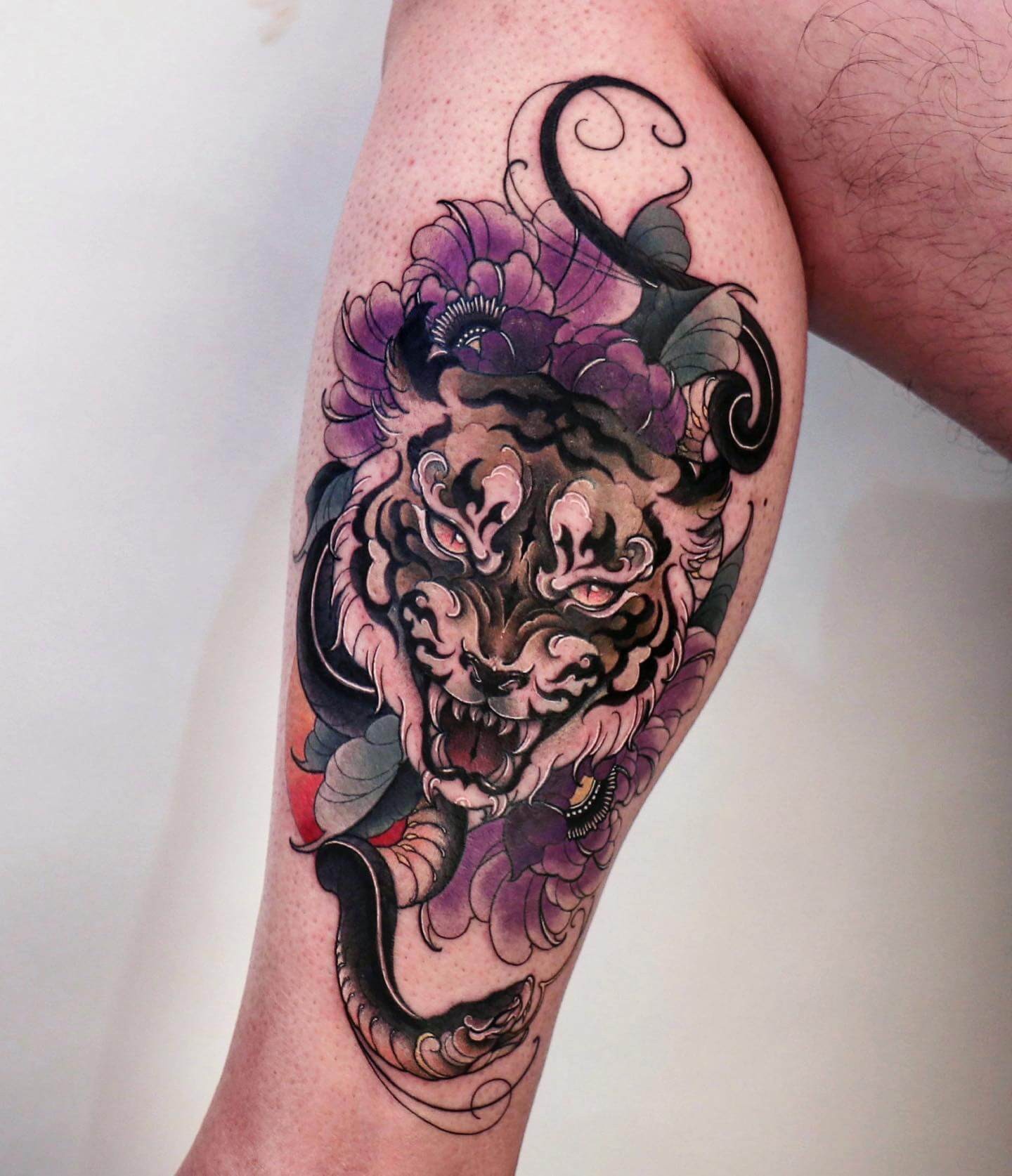 Animal leg tattoos for men