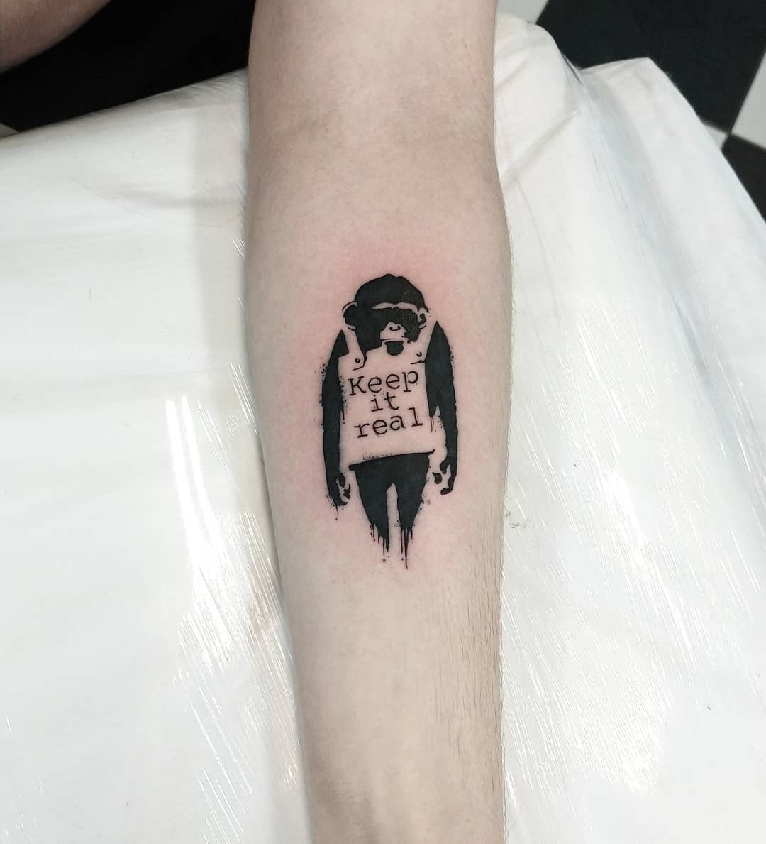 Keep It Real Banksy Tattoo