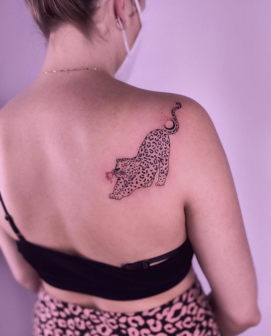 Stretching Leopard Tattoos