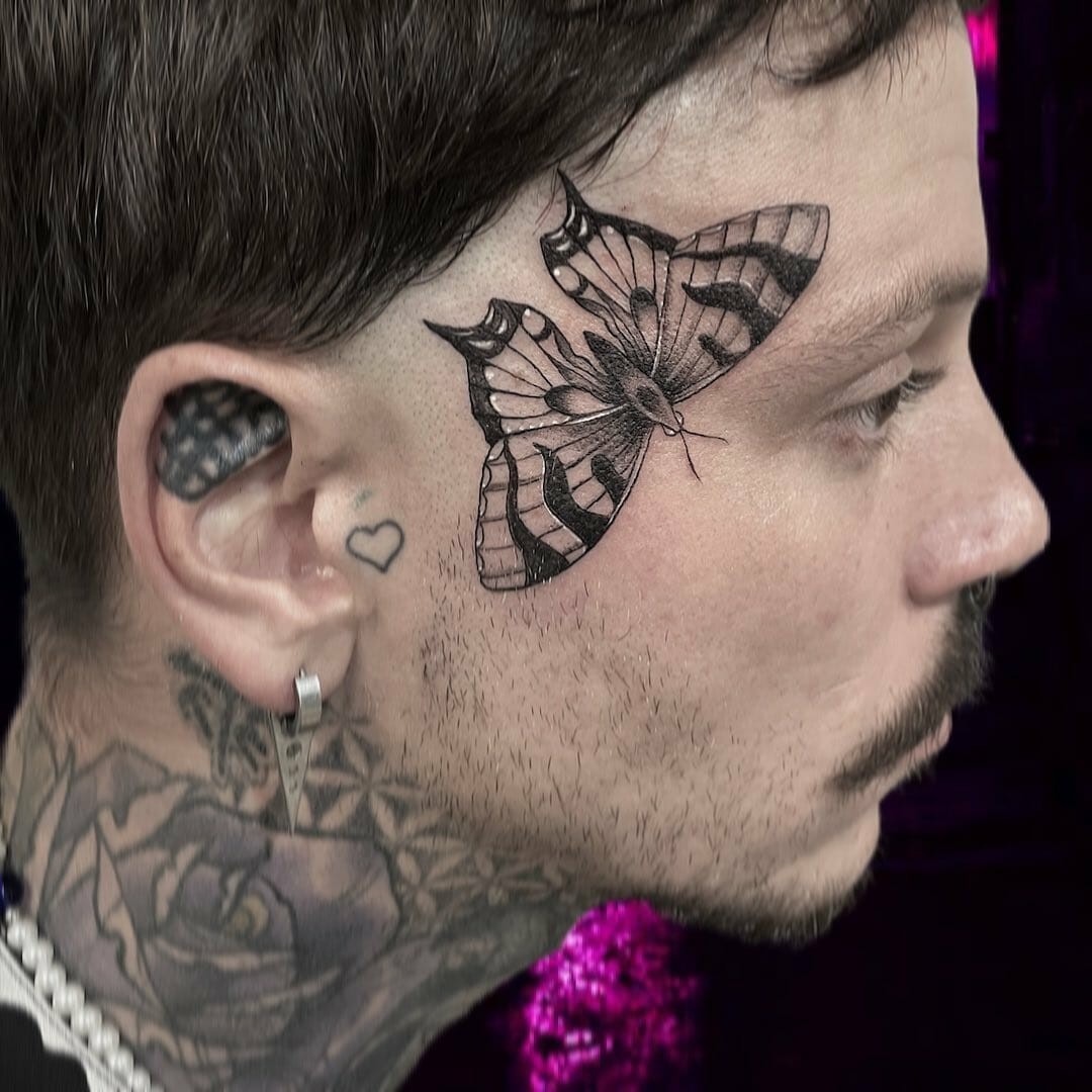 Giant Butterfly Face Tattoo