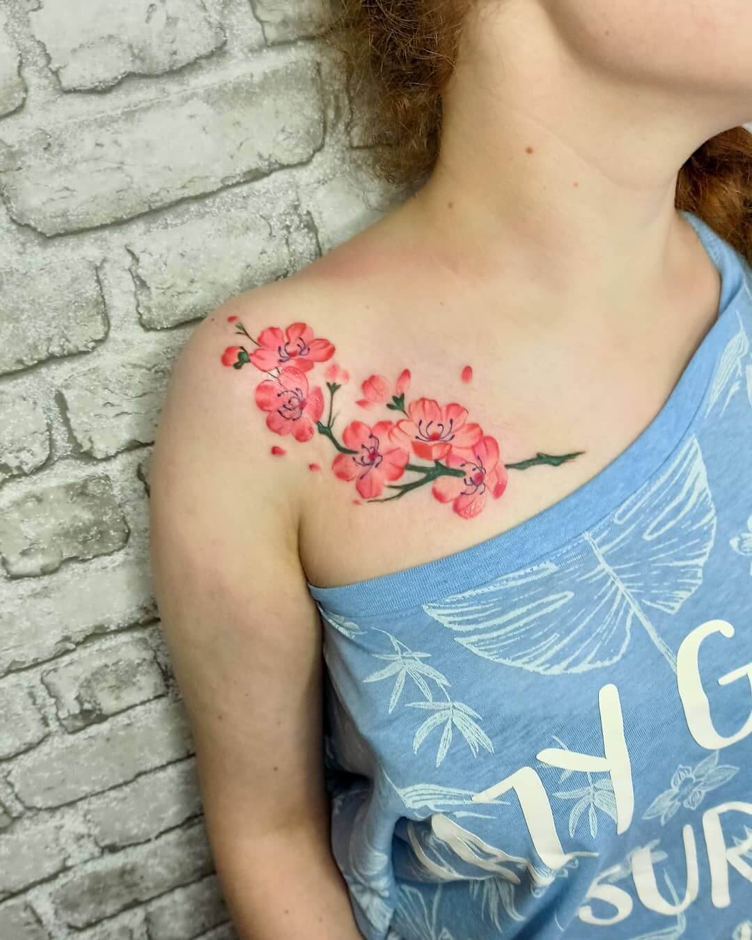 Cherry Blossom Japanese Tattoo Over Collarbone