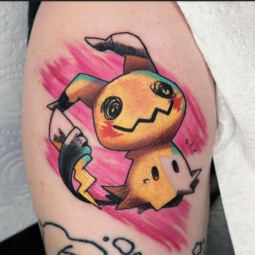 Colorful Mimikyu Pikachu Tattoo Design You’ll Love On Your Biceps