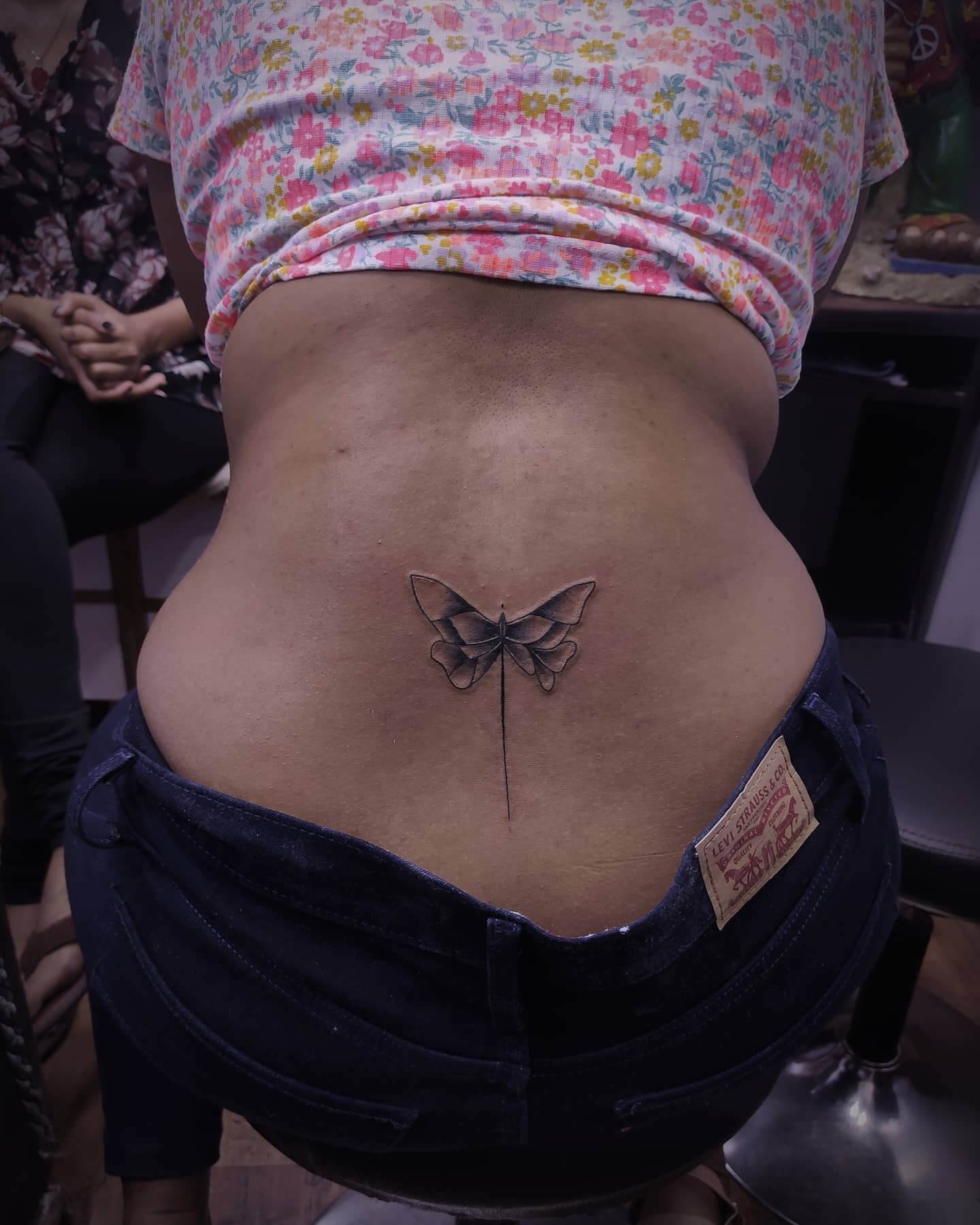 Small Butterfly Tattoo On Lower Back