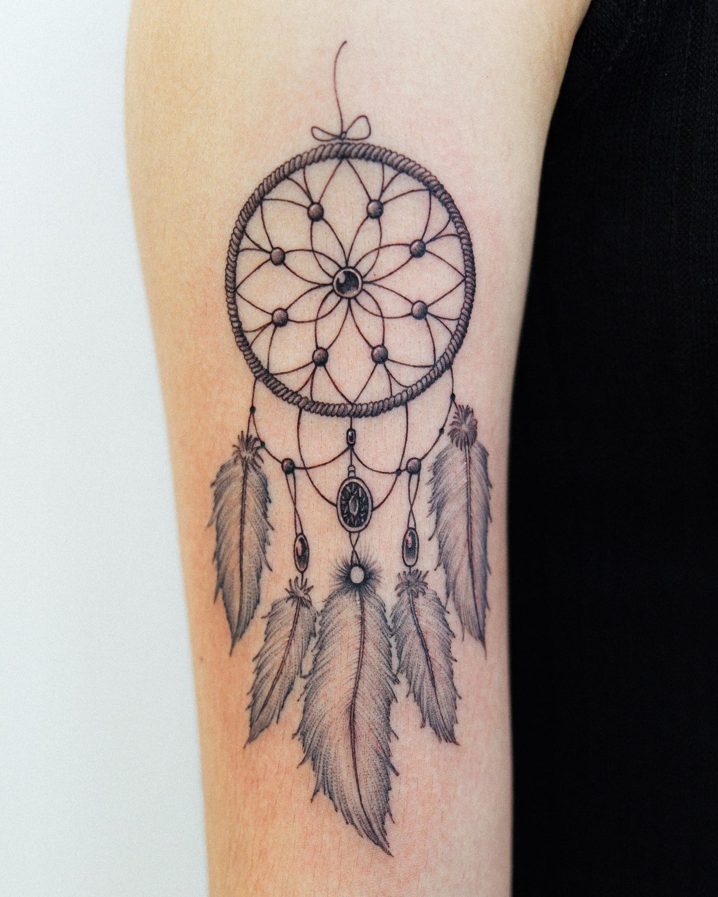 Simple Dream Catcher Tattoo In Black Ink