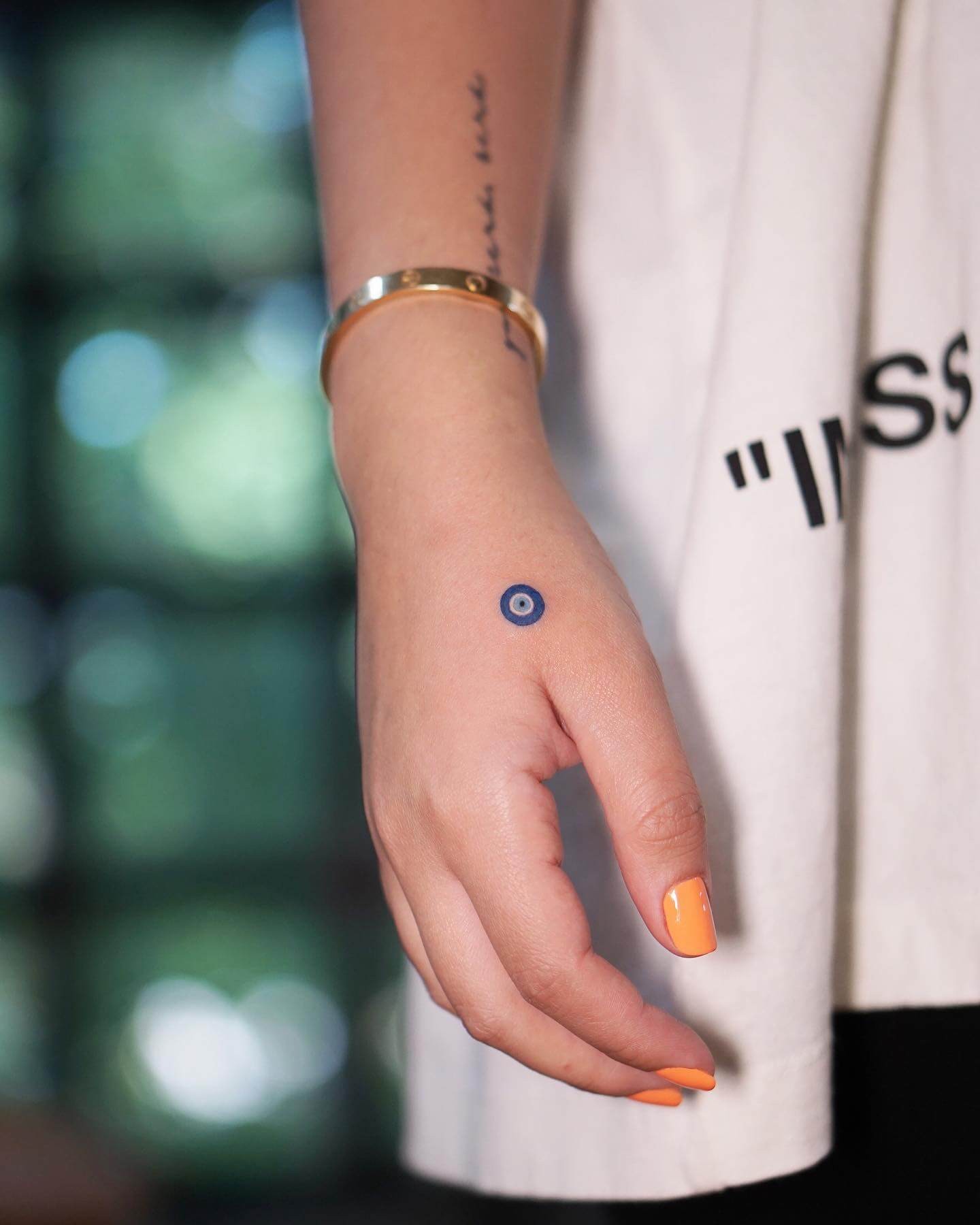 Small Blue Evil Eye Tattoo