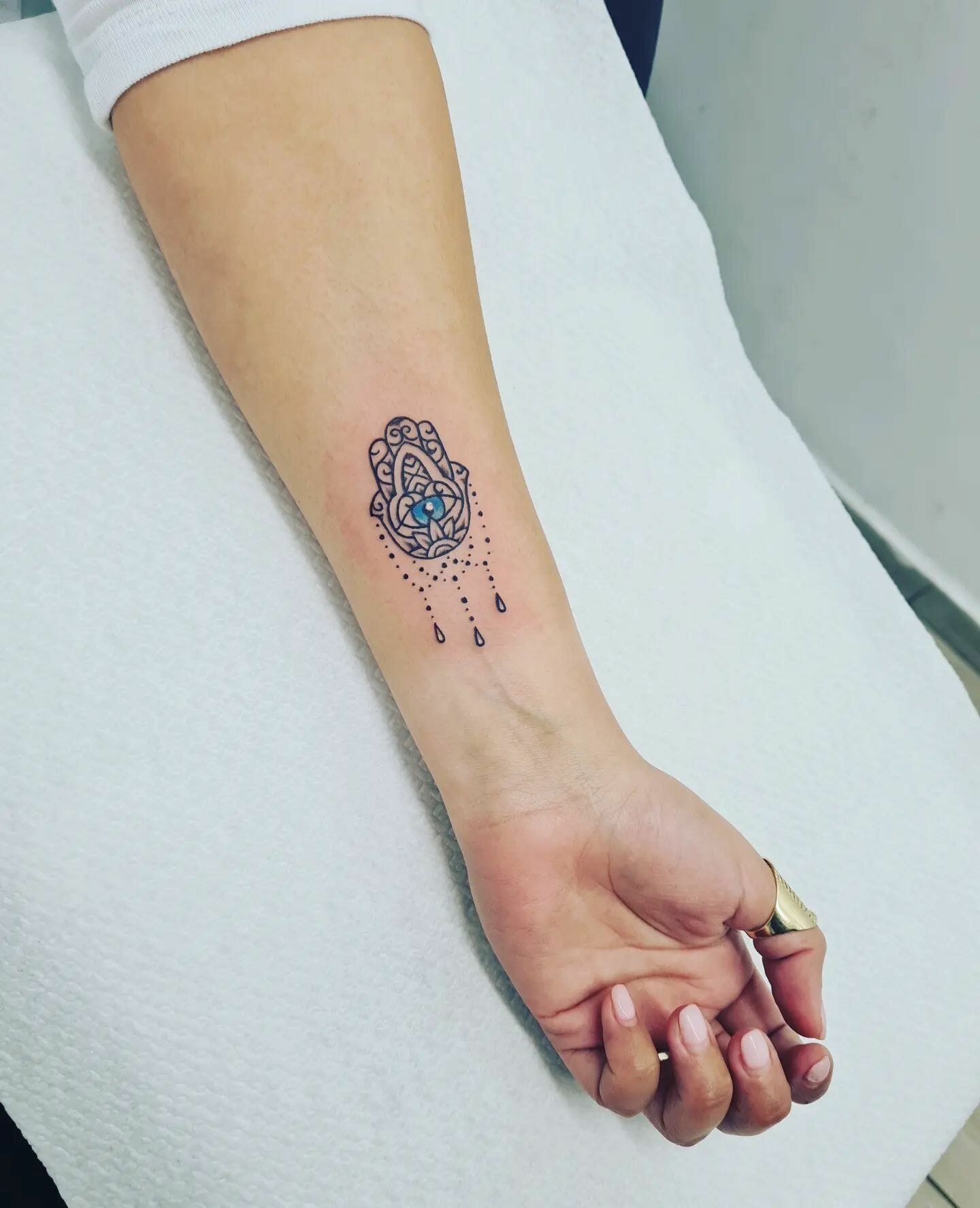 Small Hamsa Evil Eye Tattoo