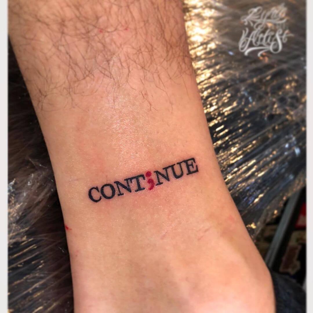 “Continue” With A Red Semicolon Tattoo