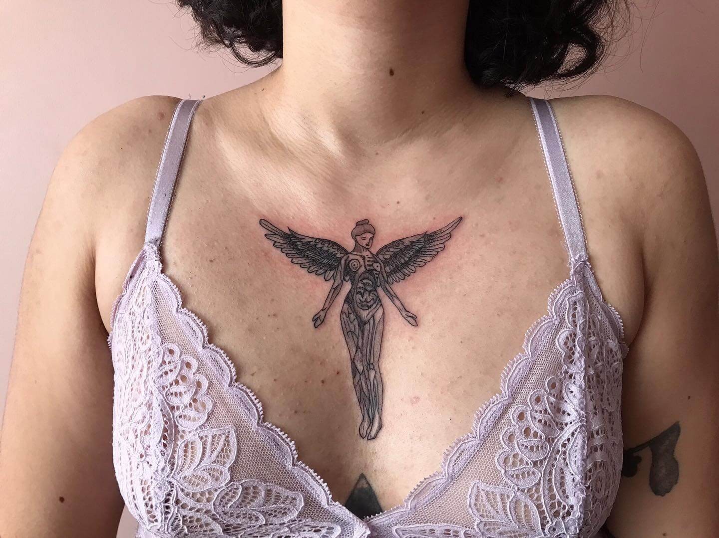 In Utero Sternum Tattoo