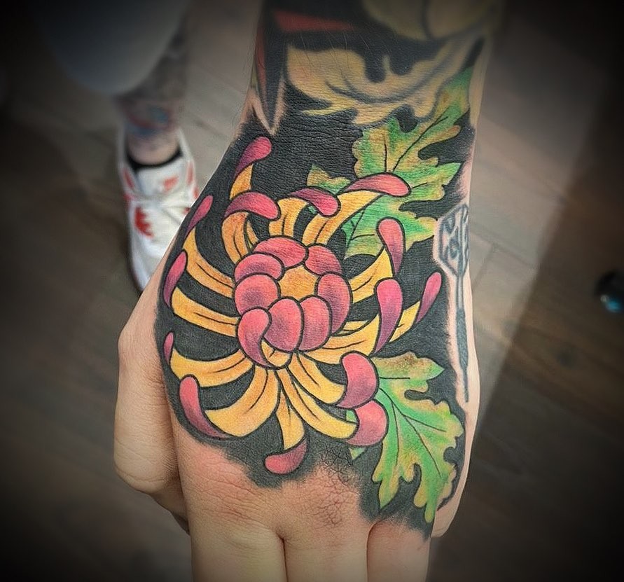 Chrysanthemum Hand Tattoo