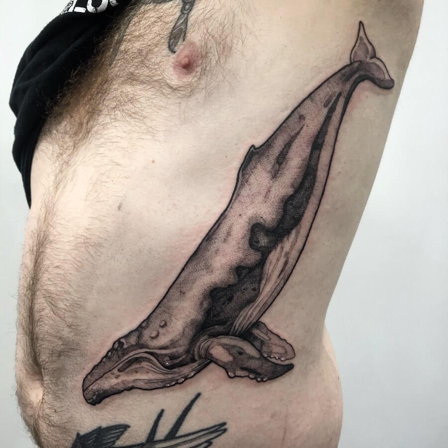 Black And Gray Ink Large Humpback Whale Tattoo Idea For Men Rib Cage Placement