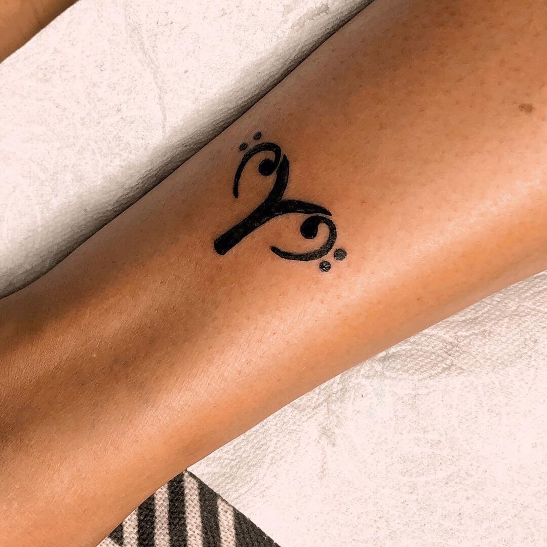 Aries Bass Clef Tattoo