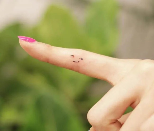 Finger Dot Tattoo