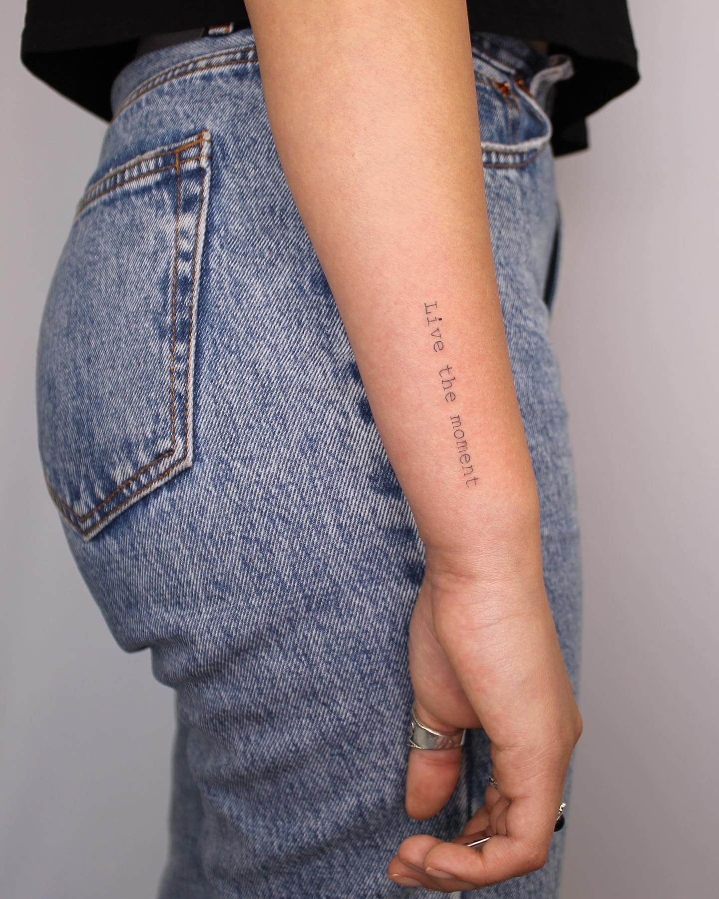 Live The Moment Single Line Quote Tattoo