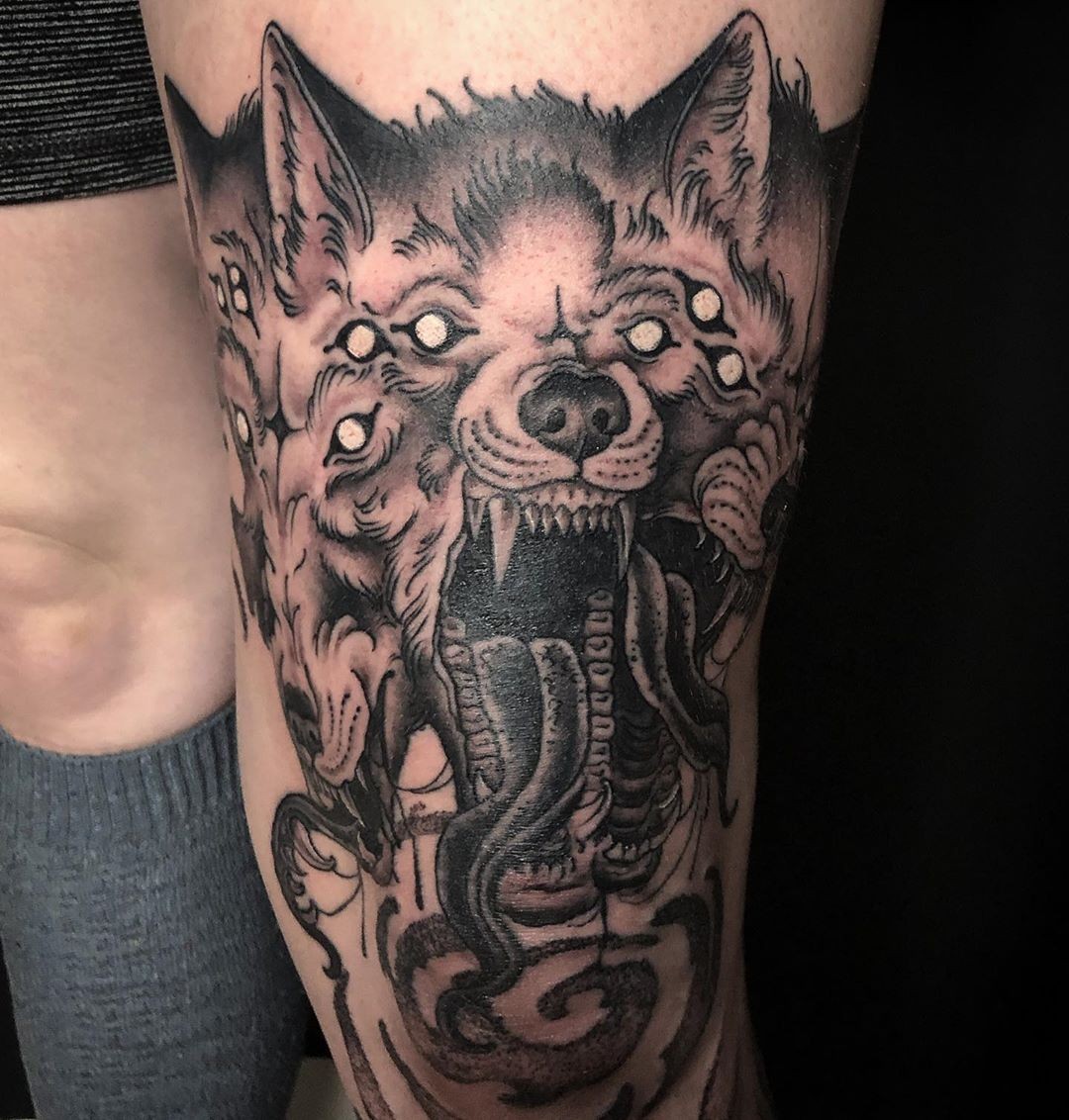 Menacing Doom Pupper In Black And Gray Cerberus Tattoo Ideas For Men Leg Placement