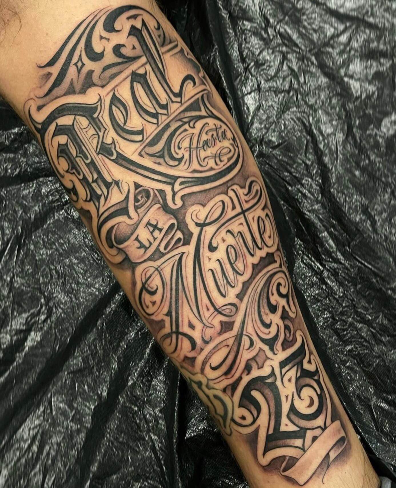 Bold Script Forearm Tattoos For Men